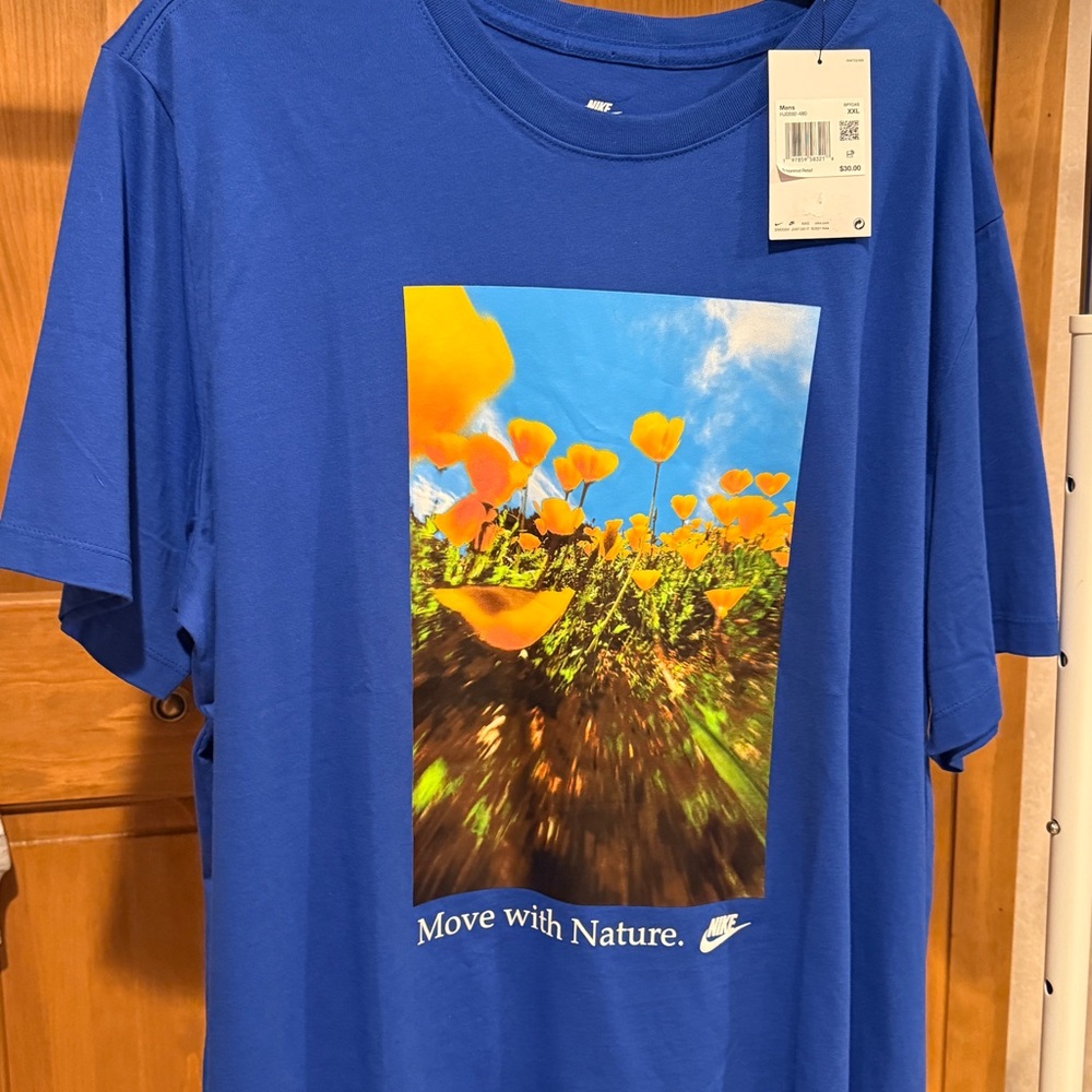 Nike Royal Blue Short-Sleeve Graphic Tee with Yellow Floral Print